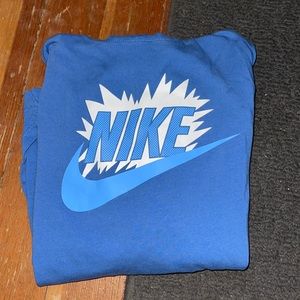One blue Nike hoodie